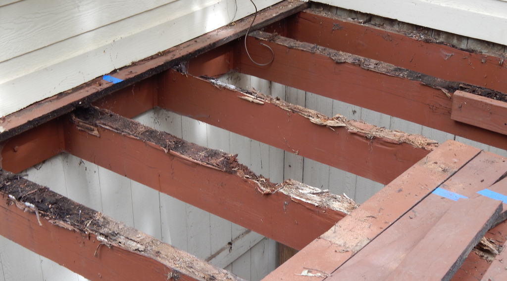 Rot on wooden deck joists and beams