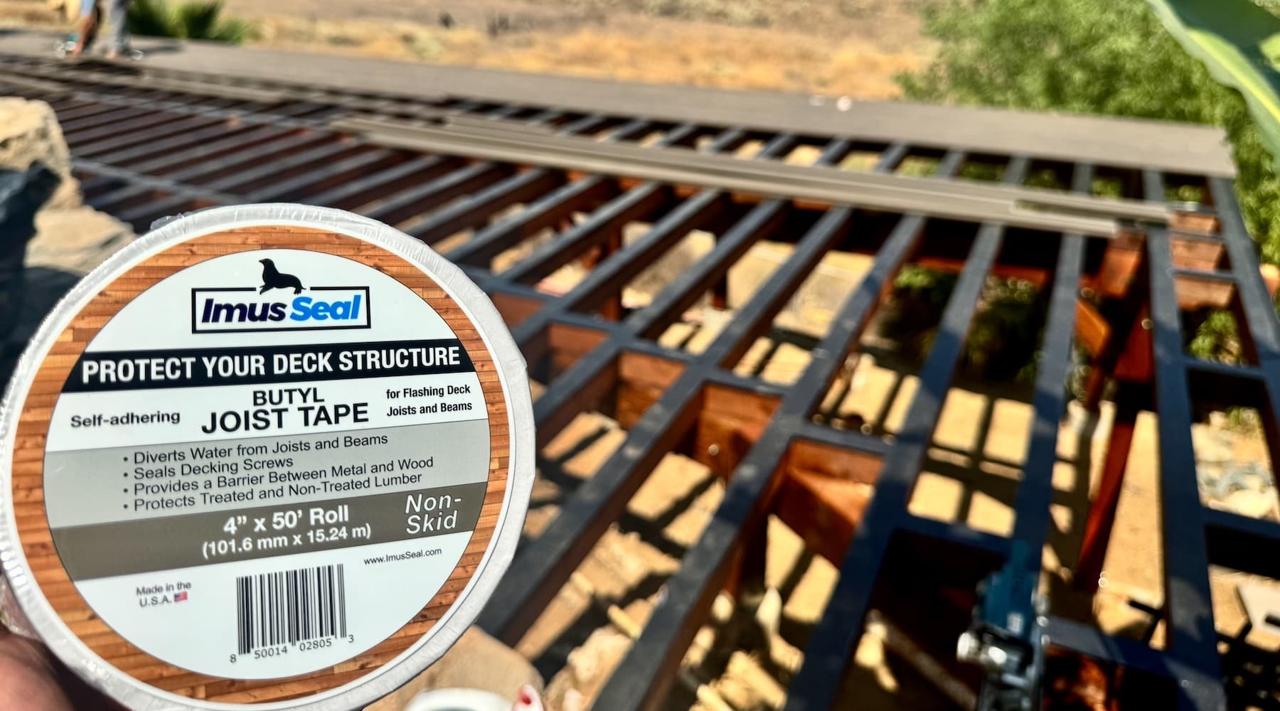 4" Imus Seal Butyl Joist Tape used to protect a new large deck structure under construction